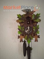 Ρολόι τοίχου ξύλινο μηχανικό με κτύπο και κούκο.